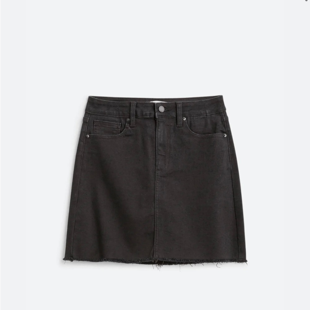 Black denim mini skirt. Never worn.